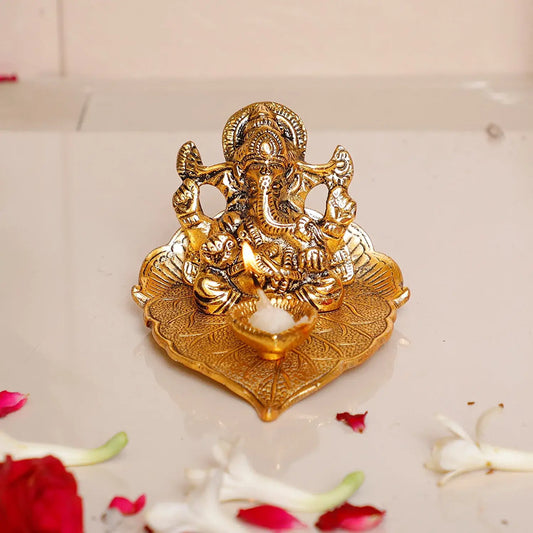 Metal Lord Ganesha On Leaf with Diya Idol for Pooja Room Showpiece